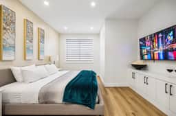 Free Parking • 3 King Beds • Desk• AC • Primary TV - Image 5